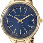 Anne Klein Women’s AK/1408NVNV Swarovski Crystal Accented Gold-Tone and Navy Blue Shimmer Resin Bangle Watch